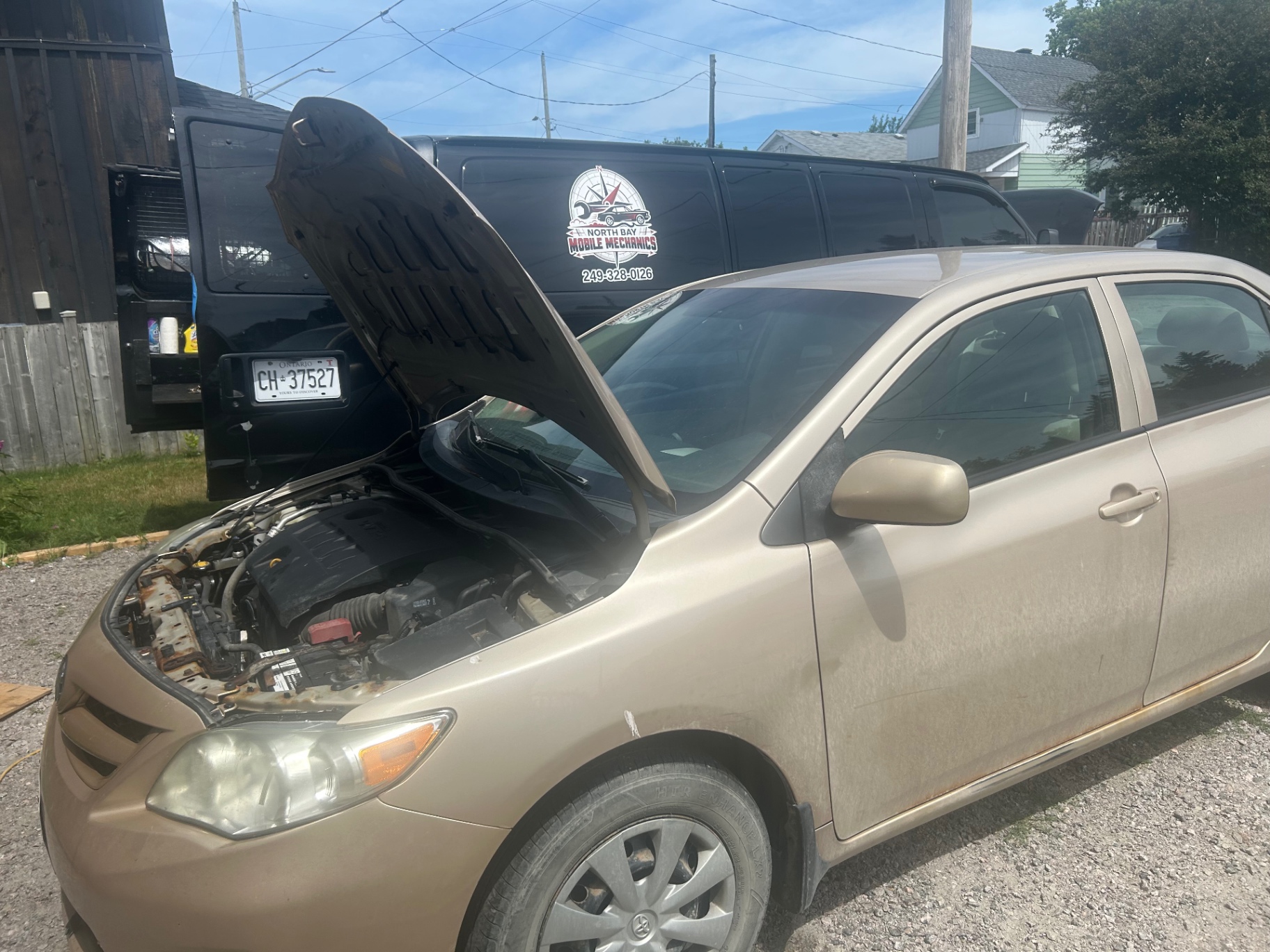 Vehicle being serviced by the mobile mechanic