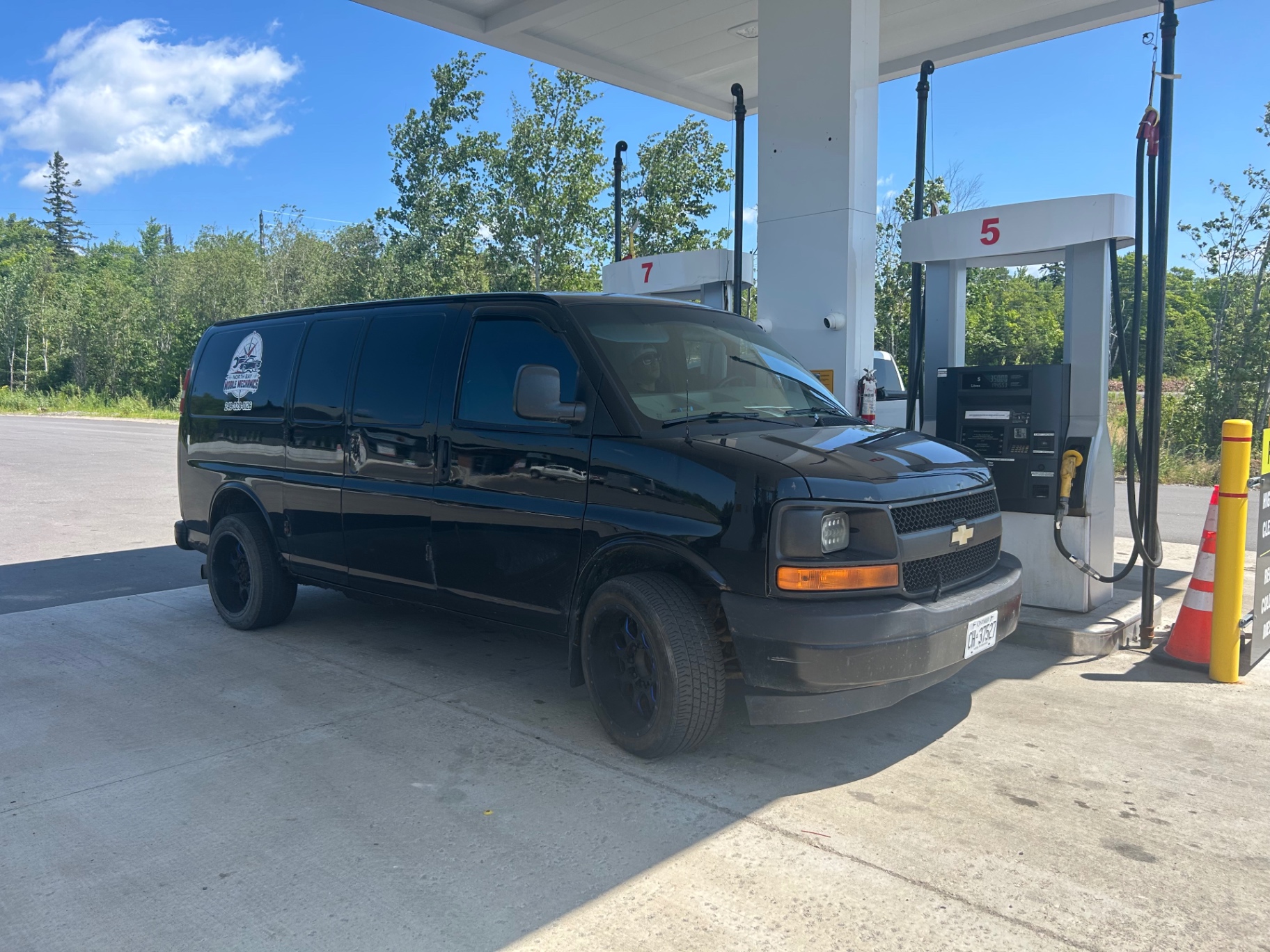 Service van fueling up